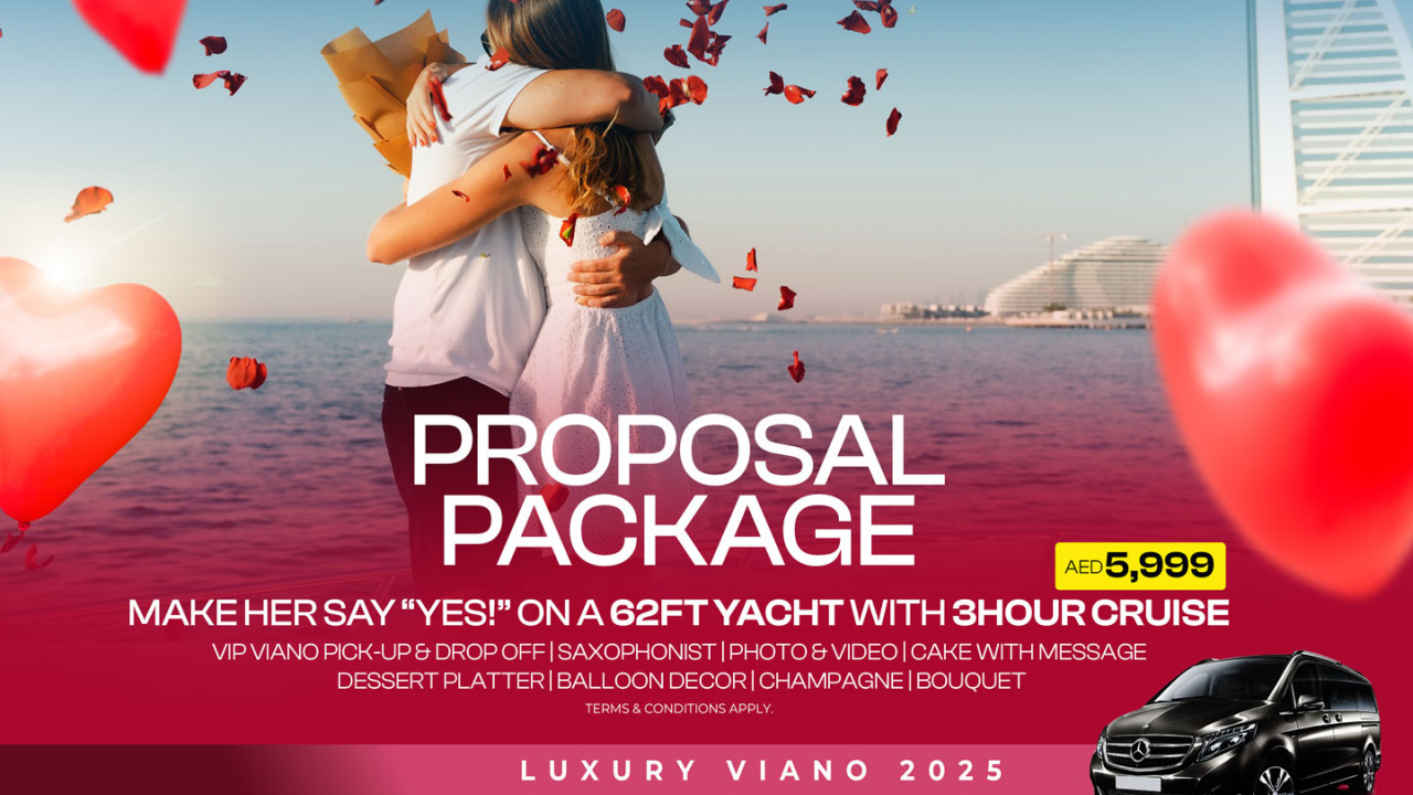 Yacht proposal setup in Dubai — rose petals, candles and champagne