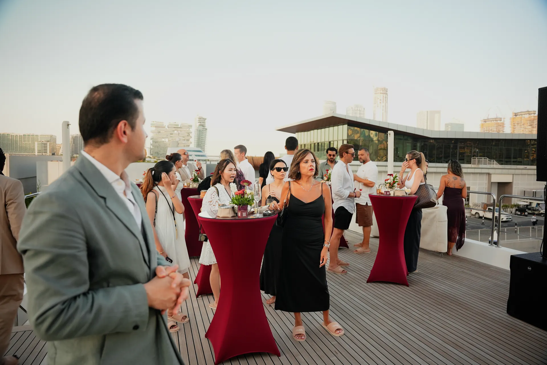 Guests mingling at sunset
